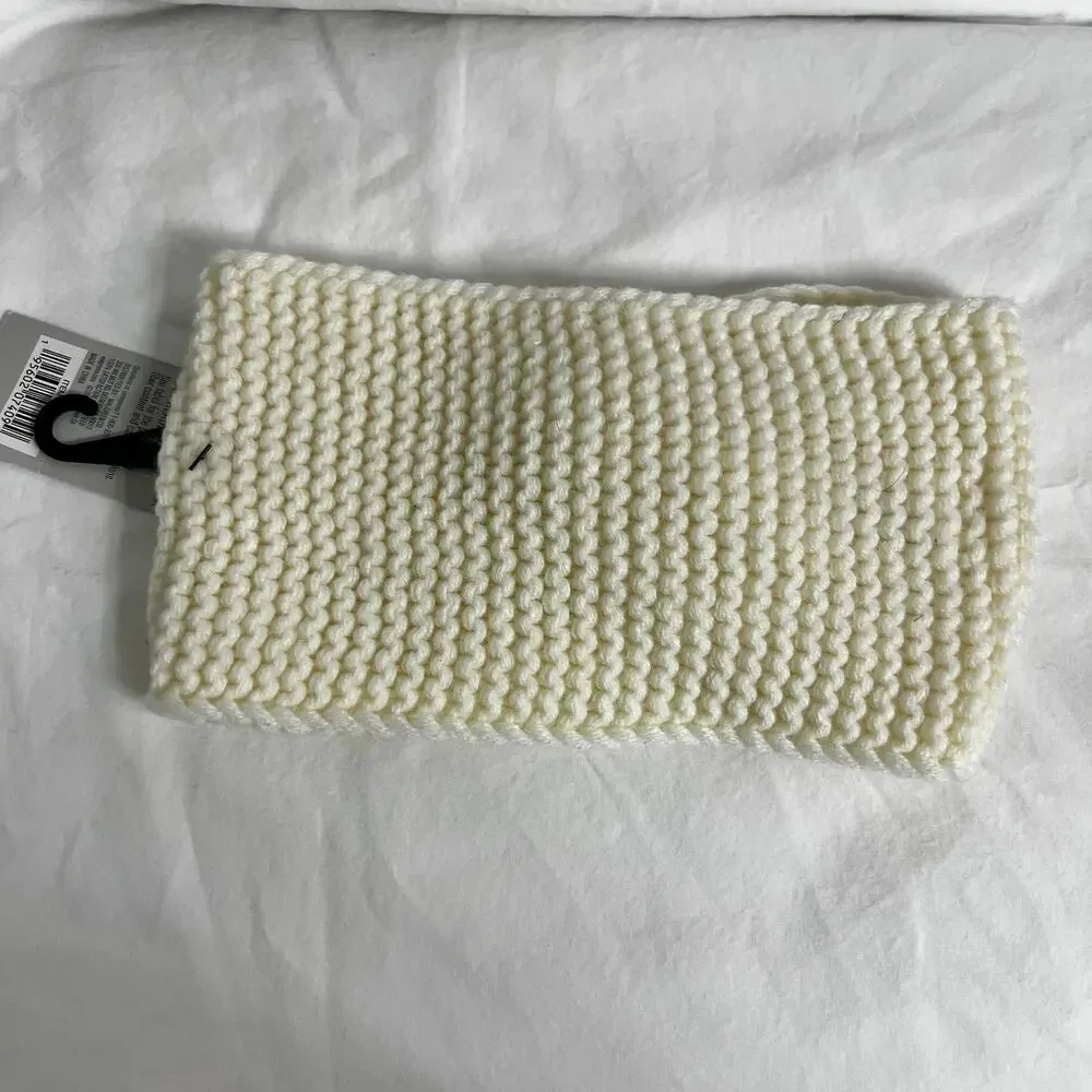 NWT cream knit headband featuring a twist detail